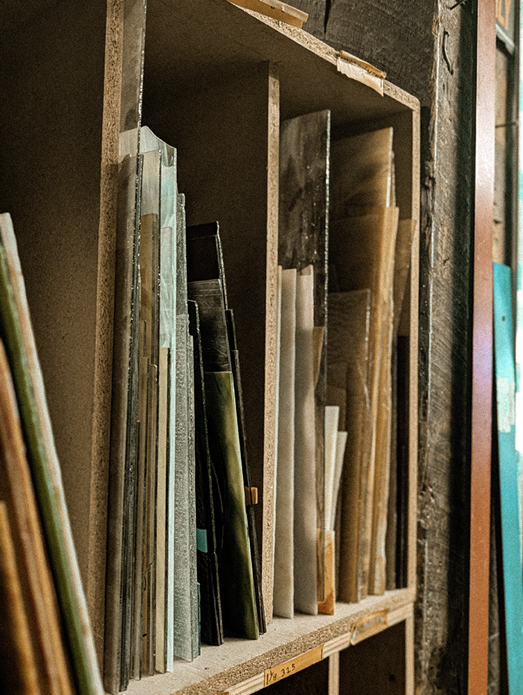 Shelf containing specialty glass sheets