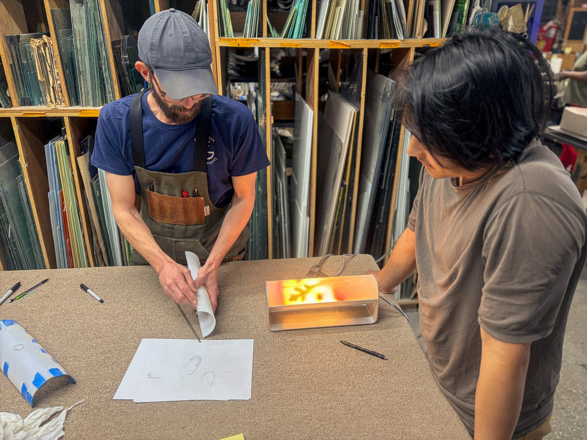 Verrité artisans working with glass